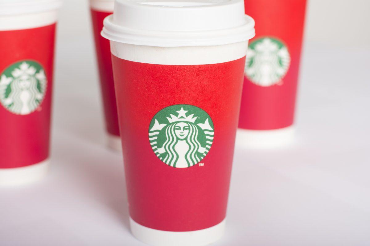 Shanghai, Сhina - November 25, 2015: Red Starbucks Coffee Cups isolated on white. Photo taken in Shanghai City, China.